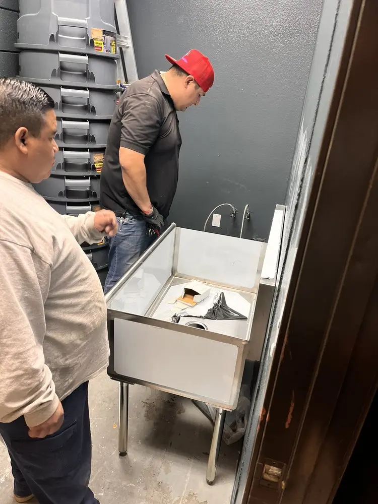 Commercial plumbing and sink installation in Mart